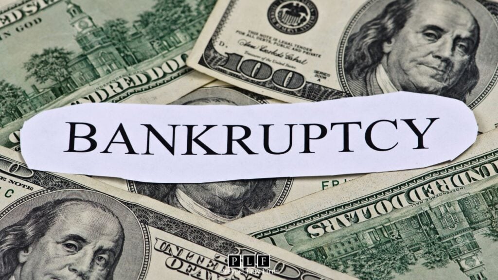 The word "bankruptcy" on top of cash for how to file bankruptcy