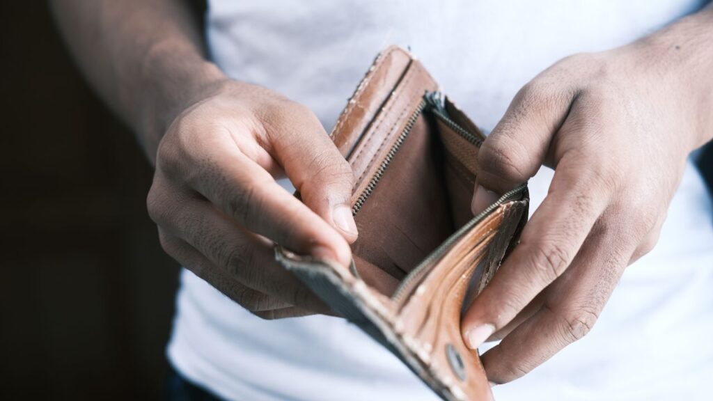 Can You File Bankruptcy Twice - photo of man holding empty wallet
