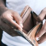 Can You File Bankruptcy Twice - photo of man holding empty wallet